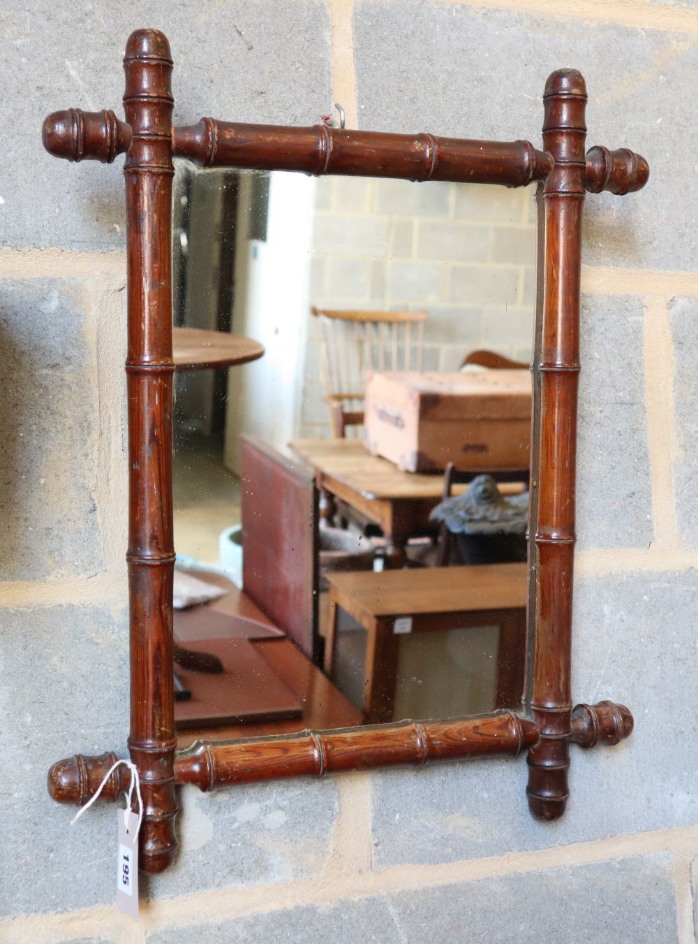 An Edwardian simulated bamboo frame wall mirror, H.56cm, W.45cm